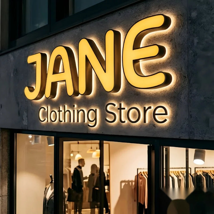 A striking dual-lit storefront signage for &