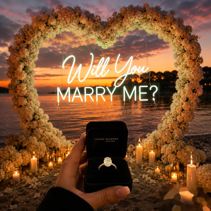 Reception backdrop neon sign with glowing “Will You Marry Me?” lettering, floral heart installation, and candlelight beach proposal decor.