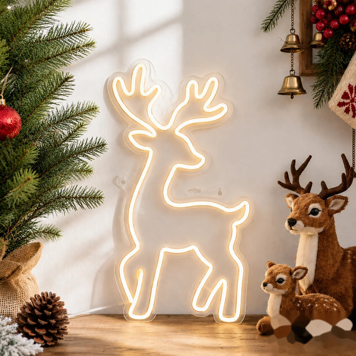 Acrylic LED neon reindeer sign with warm white lighting for Scandinavian Christmas home decor and cozy holiday tabletop styling.